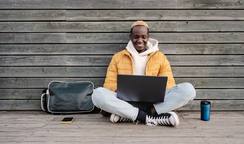 african-american-male-university-student-sitting-o-2025-01-08-02-43-26-utc african-american-male-university-student-sitting-o-2025-01-08-02-43-26-utc
