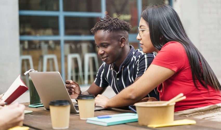 young-international-coworkers-working-together-dur-2025-01-09-15-10-56-utc